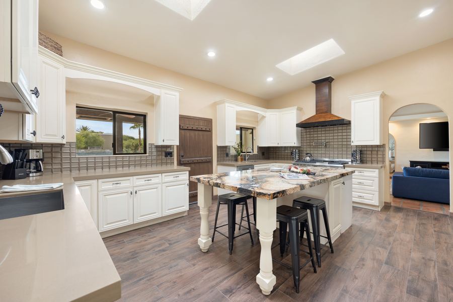 Chef's kitchen with granite island